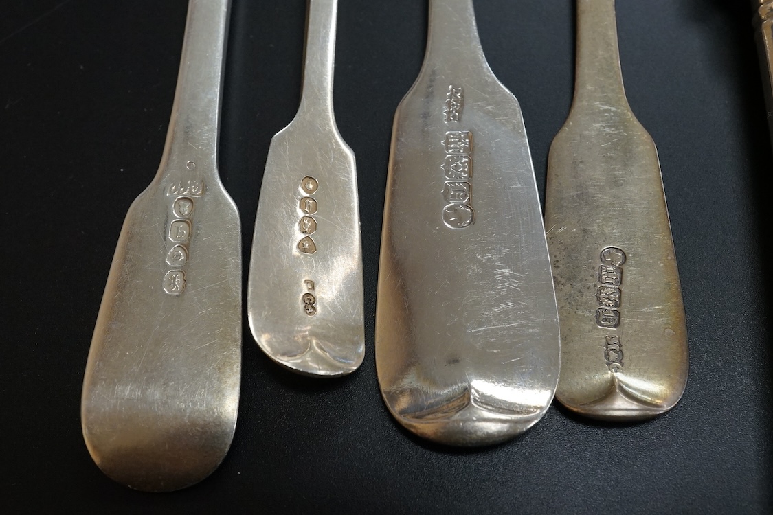 A harlequin part canteen of 19th century silver fiddle pattern flatware, comprising fifty four items, various dates and makers including twelve table spoons, twelve table forks and six dessert spoons with engraved initia